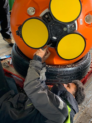 Unscrewing from its syntactic buoy a long-range ADCP, after it was brought in the hangar. Pic taken by Dr. Lewis Drysdale. 